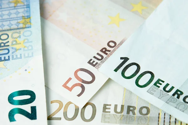 Dinero en euros. Fondo en efectivo en euros. Billetes en euros — Foto de Stock