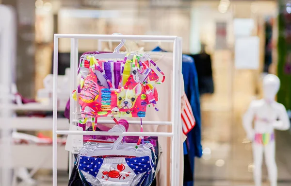 Women's swimsuits for sale at a seaside shop. Advertise, Sale, F — Stock Photo, Image