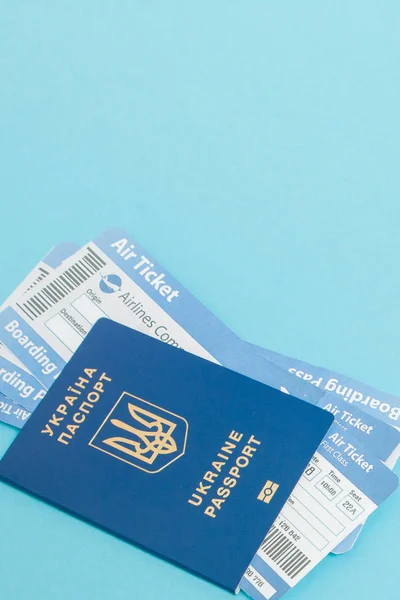 Passport and air tickets on a blue background. mockup empty blank, copy space