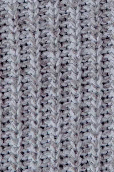 Knitting Seamless Pattern. Grey wool background. Old handmade kn