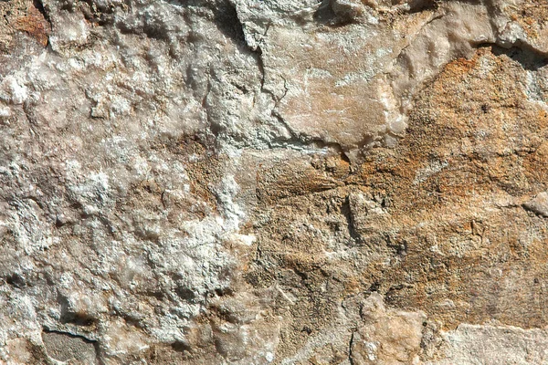 Δομή της επιφάνειας της πέτρας, που χρησιμοποιείται ως φόντο. Λίθινη υφή. Φυσικοί βράχοι — Φωτογραφία Αρχείου