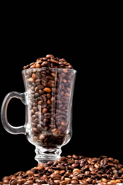 Black coffee in white cup and coffee beans on black background. — Stock Photo, Image