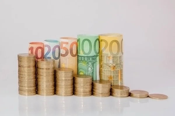 Dieci, venti, cinquanta, cento, duecento e monete euro rotolo — Foto Stock