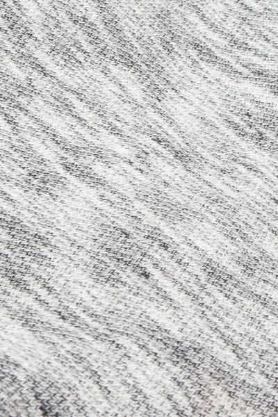 Véritable tissu tricoté gris bruyère en fibres synthétiques fond texturé — Photo