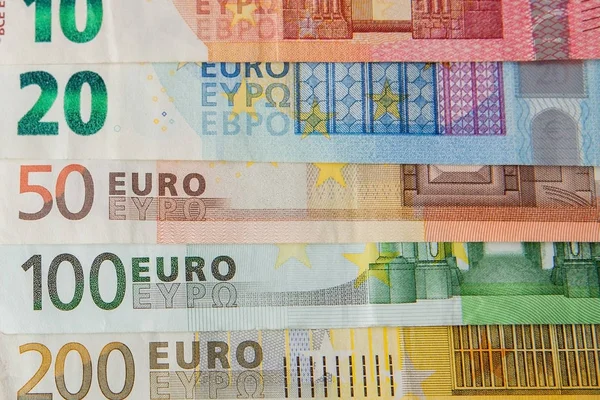 Dinero en euros. Fondo en efectivo en euros. Billetes en euros. Antecedentes —  Fotos de Stock