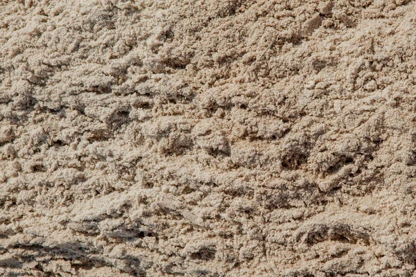 Textura de arena húmeda en la playa de la orilla del mar - aspecto retro de estilo vintage —  Fotos de Stock