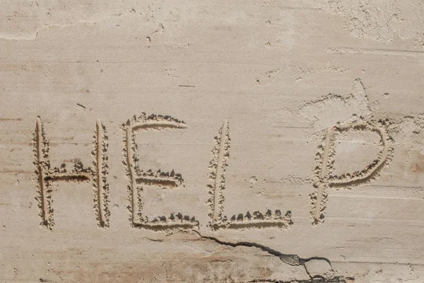 Help me the inscription on the sand. Please help me. On a tropical beach