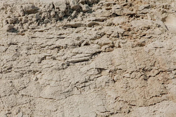 Texture de sable humide sur la plage au bord de la mer - look rétro et vintage — Photo