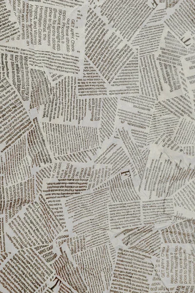 Black and white repeating torn newspaper background. Continuous pattern left, right, up and down — Stock Photo, Image