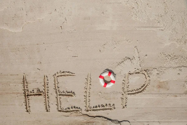 Help me the inscription on the sand. Please help me. On a tropic