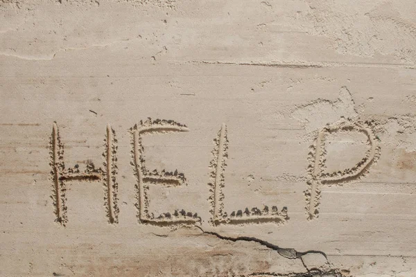 Help me the inscription on the sand. Please help me. On a tropic