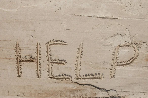 Help me the inscription on the sand. Please help me. On a tropical beach