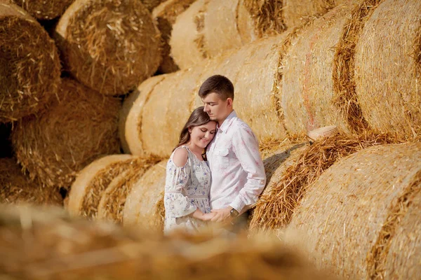 Happy young couple on straw, romantic people concept, beautiful — Stock Photo, Image