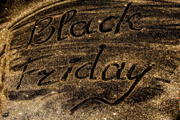 Sparkling inscription Black Friday on a black background