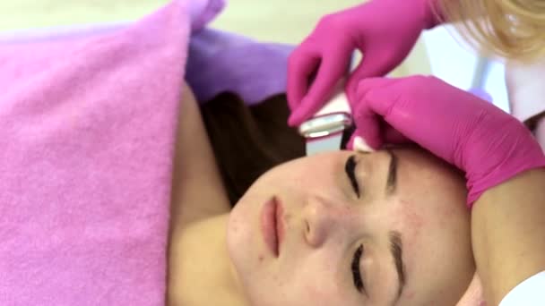 Ultrasonic Scrabbing Young Woman Receiving Ultrasound Cavitation Facial Peeling Cleansing — Stock Video