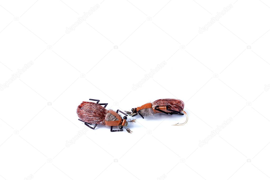 Fishing fly with hook isolated on white background.