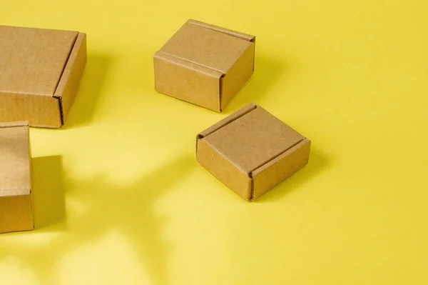 Shadow Airplane and stack of cardboard boxes. concept of air cargo and parcels, airmail. Fast delivery of goods and products. Cargo aircraft. Logistics, connection to hard-to-reach places. Banner, copy space.