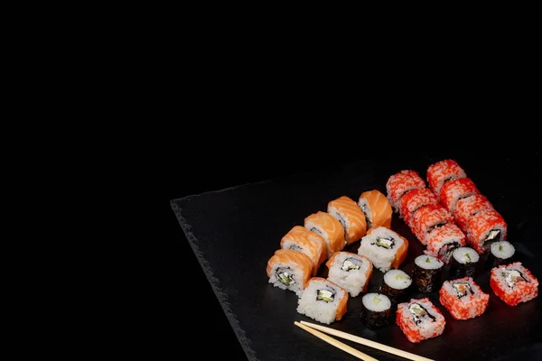 Set Sushi Roll Black Slate Background Food Fish Philadelphia Japanese — Stock Photo, Image