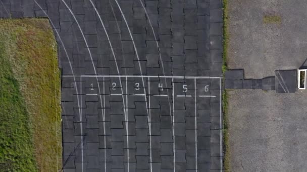 Correr textura de pista con números de carril, Correr fondo de pista — Vídeos de Stock