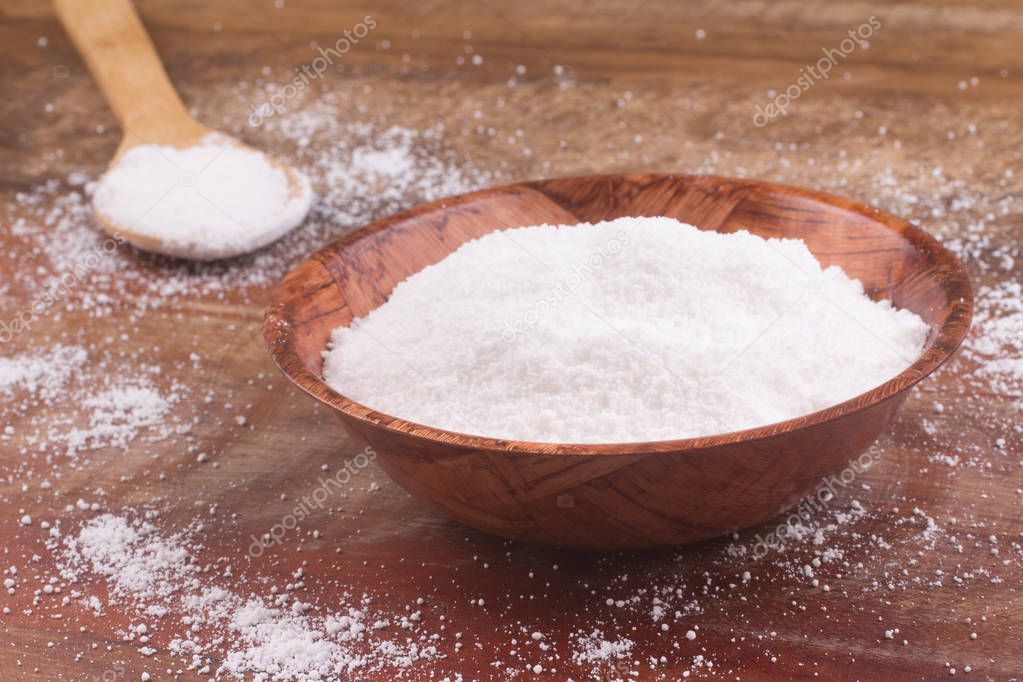 Tapioca: Manioc Flour in a bowl over a wooden table