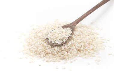Pile of arborio rice isolated on white background clipart