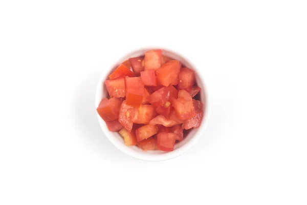 被切碎的番茄在一个白色碗查出在白色背景顶视图 — 图库照片