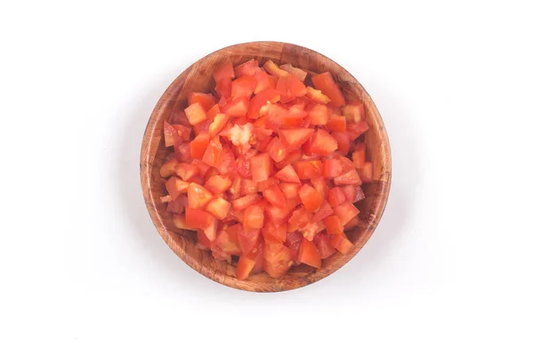 切碎的西红柿在一个木碗查出在白色背景顶视图 — 图库照片