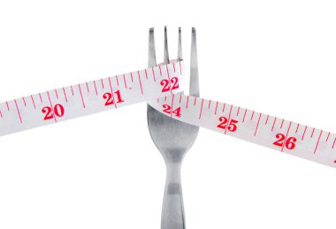 Çatal kasette ölçme kilo beyaz arka plan üzerinde izole kavramı,.