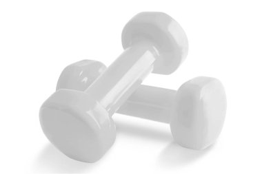 İki beyaz dambıl, beyaz arka plan üzerinde izole.