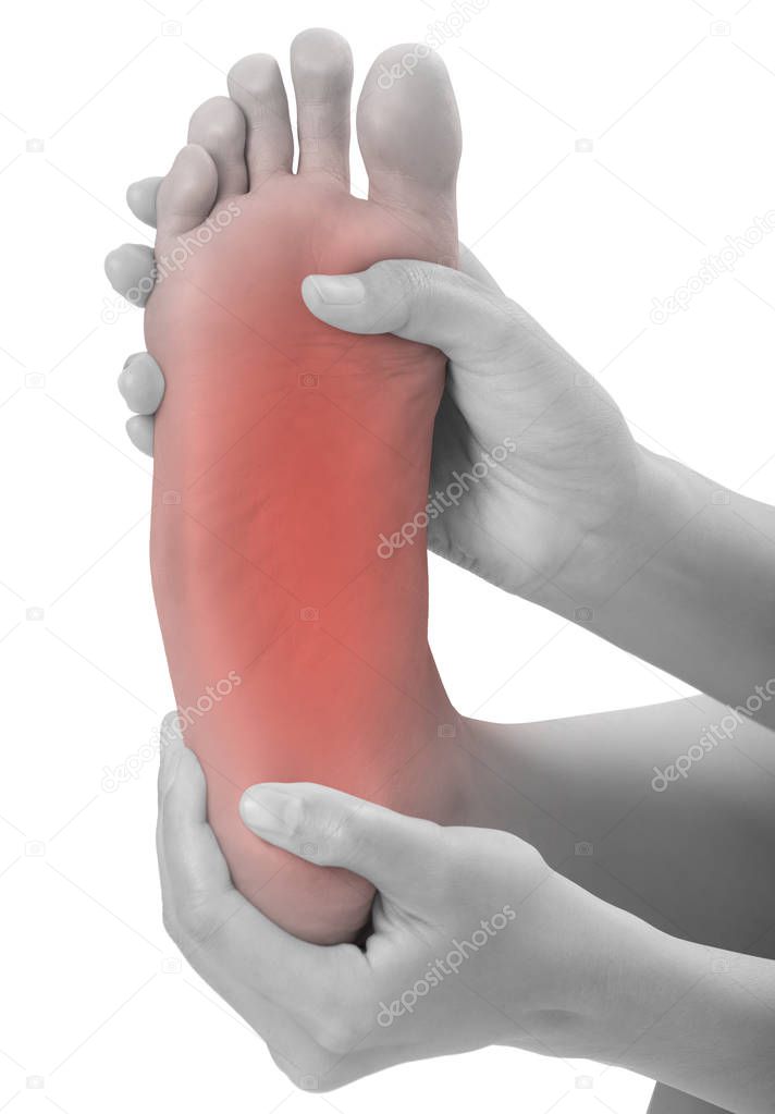 woman hands holding  beautiful healthy foot and massaging in pain area, black and white color with red highlighted, Pained body Concept, isolated on white background.