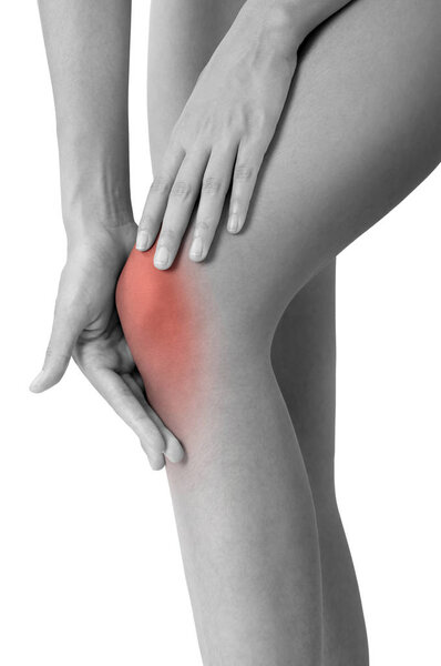 woman holding her beautiful healthy long leg with massaging knee in pain area black and white color with red highlighted, Isolated on white background.
