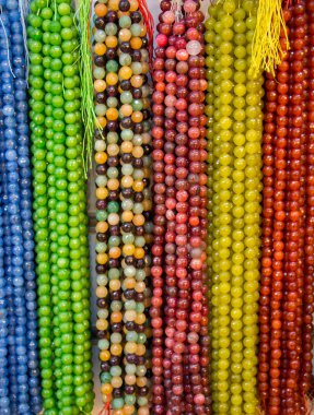 Set of praying beads of various colors clipart