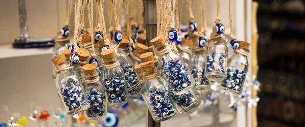 Little Transparent Glass Bottles Filled Blue Evil Eye Beads — Stock Photo, Image