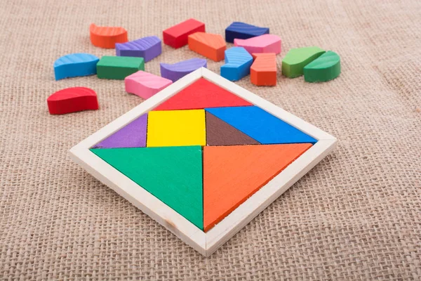 Kleurrijke Stukjes Van Een Vierkante Tangram Puzzel — Stockfoto