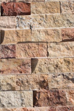 Arkaplan dokusu olarak dekoratif küp taş duvar