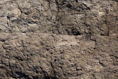 Arka plan dokusu olarak doğal kaya veya taş yüzeyi