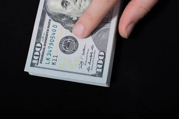 Beyaz Arka Planda Ele Tutuşan Amerikan Doları Banknotları — Stok fotoğraf