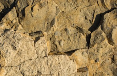 Arka plan dokusu olarak doğal kaya veya taş yüzeyi