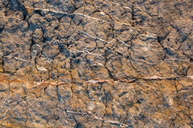Arka plan dokusu olarak doğal kaya veya taş yüzeyi
