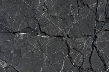 Arka plan dokusu olarak doğal kaya veya taş yüzeyi