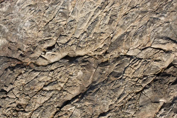 Arka plan dokusu olarak doğal kaya veya taş yüzeyi