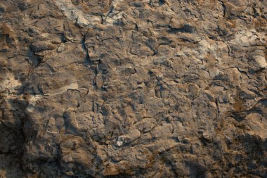 Arka plan dokusu olarak doğal kaya veya taş yüzeyi