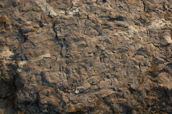 Arka plan dokusu olarak doğal kaya veya taş yüzeyi