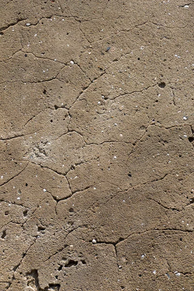 Arka plan deseni olarak çatlamış yüzey