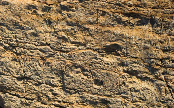 Arka plan dokusu olarak doğal kaya veya taş yüzeyi