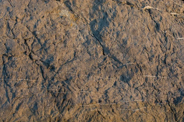 Arka plan dokusu olarak doğal kaya veya taş yüzeyi