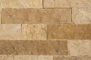 Arka plan doku olarak küçük taşlarla duvar