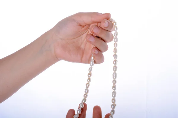 Hand Holding Pearl Necklace White Background — Stock Photo, Image