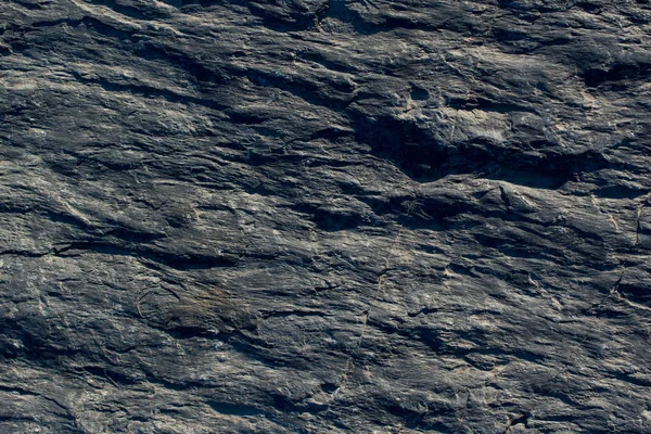 Arka plan dokusu olarak doğal kaya veya taş yüzeyi