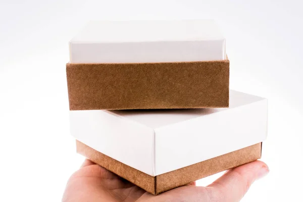 Hand Holding Cardboard Boxes White Background — Stock Photo, Image